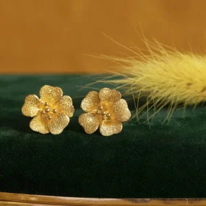 Online Gouden bloem oorstekers 22 krt Oorstekers