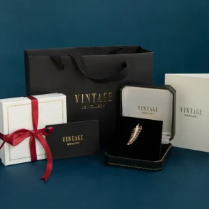 Outlet Gouden broche met saffier 14 krt Broches